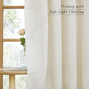 Natural linen-look light filtering curtain panel in off-white, providing privacy by a bright window.