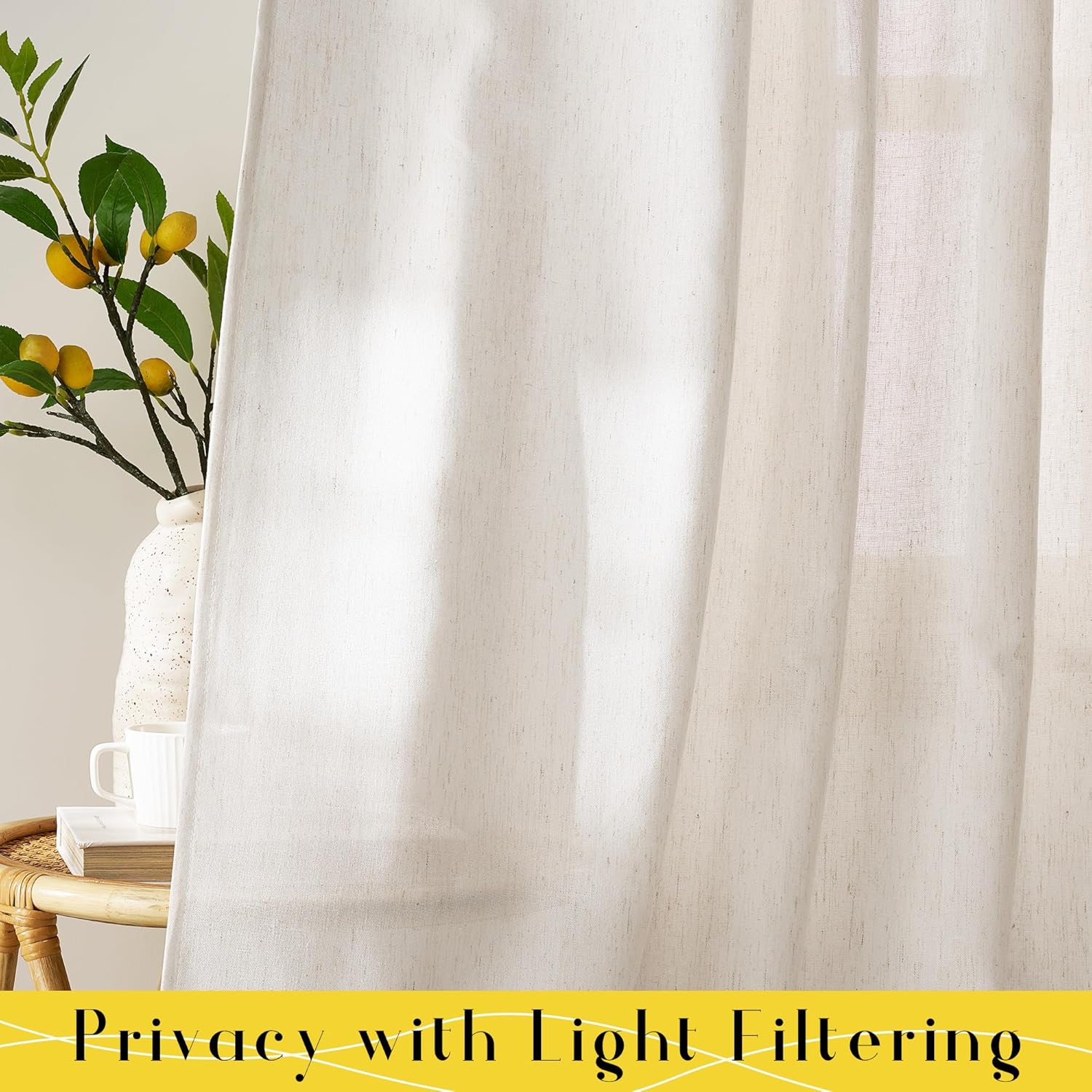 Natural textured linen blend curtains in off-white, gently filtering light and providing privacy.