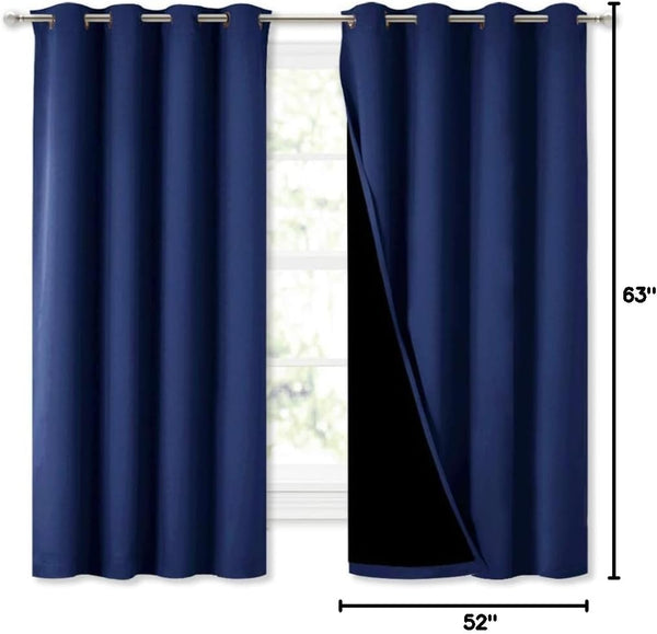 Navy blue blackout curtains with silver grommet top. One panel shows black lining. 63x52 inches.