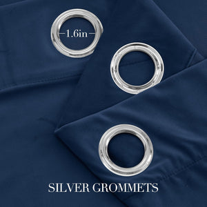 Close-up of navy blue fabric curtains with shiny silver grommets, one measured at 1.6 inches diameter.