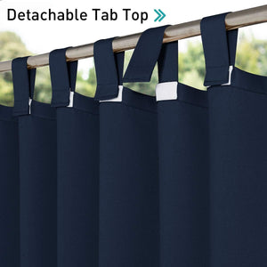 Navy blue curtains with detachable tab top loops secured by white fasteners on a gold curtain rod.