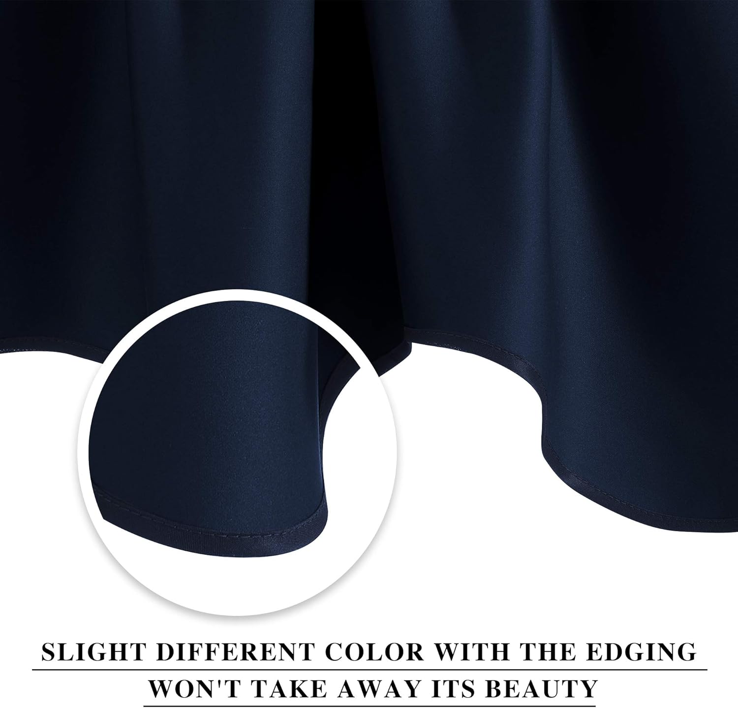 Close-up of dark navy blue fabric showing a neatly stitched hem. Magnified view highlights subtle edging color.