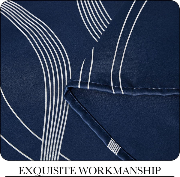 Dark blue textile with elegant white flowing stripes, showcasing precise stitching on a finished hem.