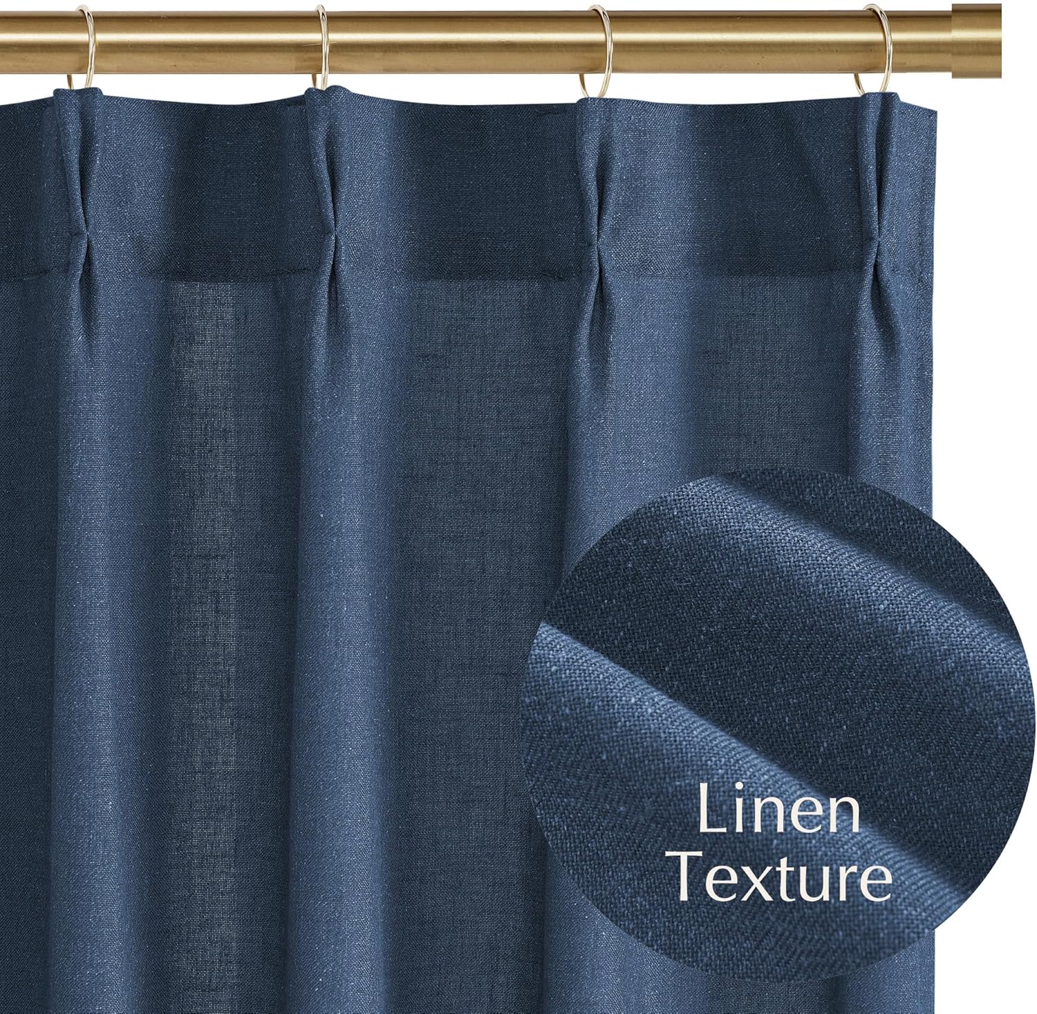 Navy blue linen curtain with a pinch pleat top, displaying its natural woven texture and hanging from a golden rod.