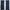 A pair of dark navy blue curtains with a metallic silver wavy pattern and grommet top.