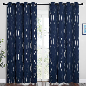 A pair of dark navy blue curtains with a metallic silver wavy pattern and grommet top.