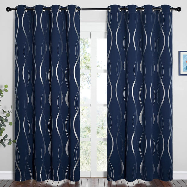 A pair of dark navy blue curtains with a metallic silver wavy pattern and grommet top.