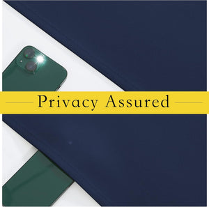 Navy blue opaque fabric sample with a green smartphone hidden behind, demonstrating assured privacy.