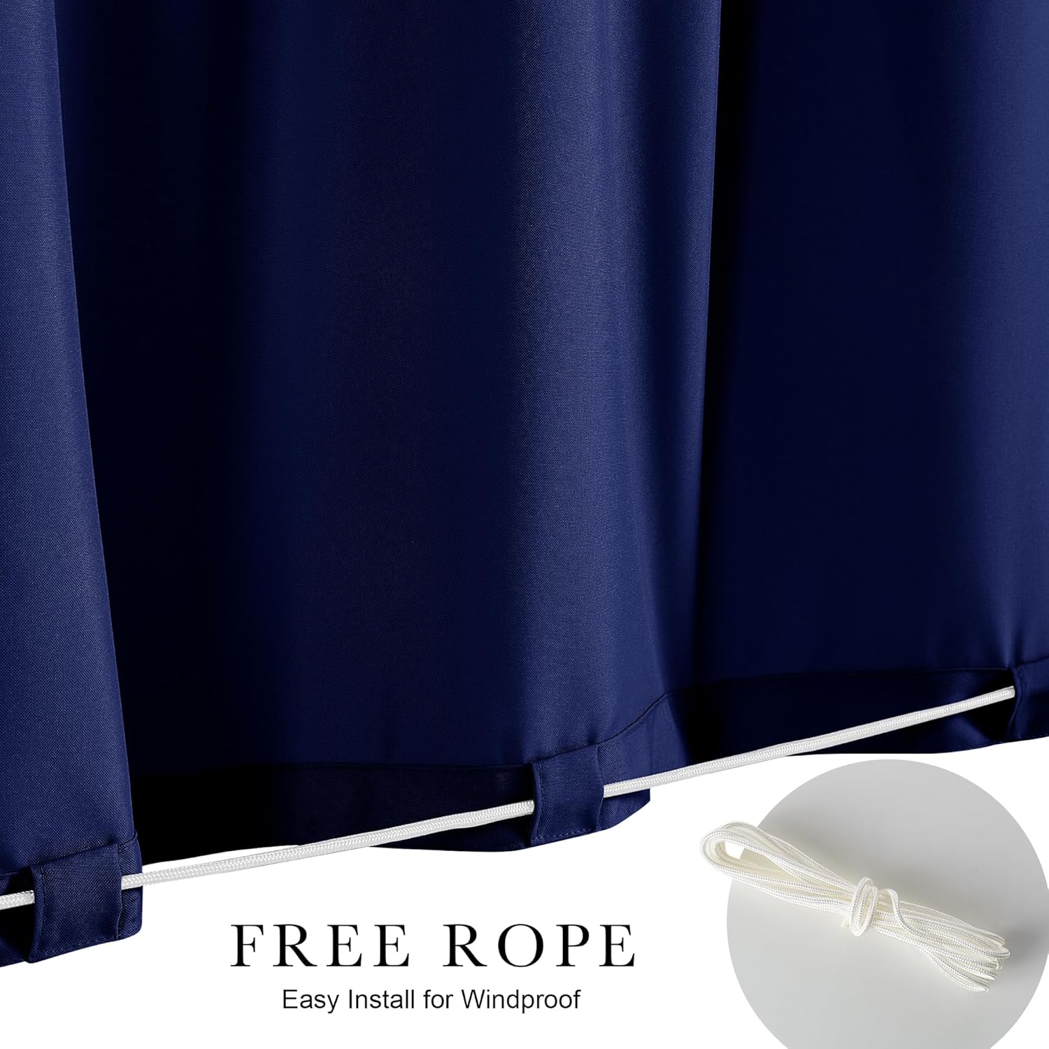 Navy blue outdoor curtain bottom secured with white rope for windproof installation. Coiled rope shown.