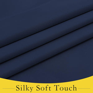 Close-up of navy blue fabric with visible soft, silky texture and elegant folds