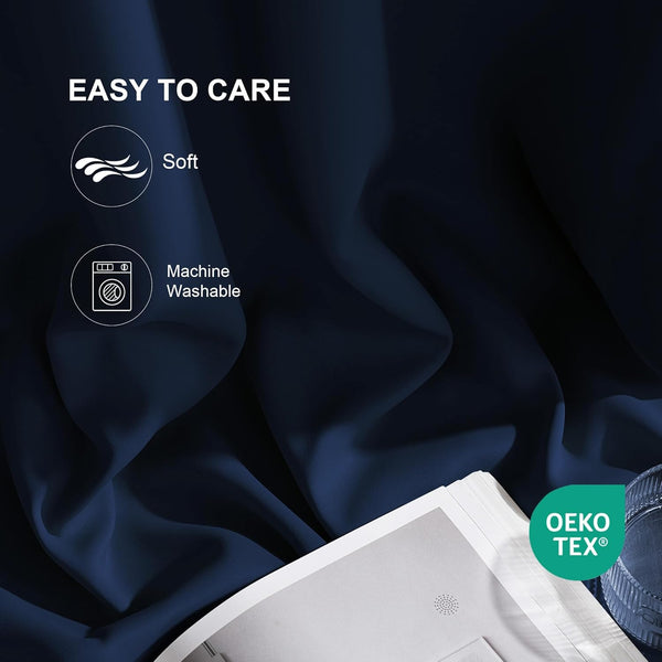 Soft, dark navy blue fabric draped, showing its easy-care and machine washable features.