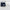 Navy blue complete curtain kit. Includes two panels, rope, sticky tape, and hardware for quick, windproof setup.