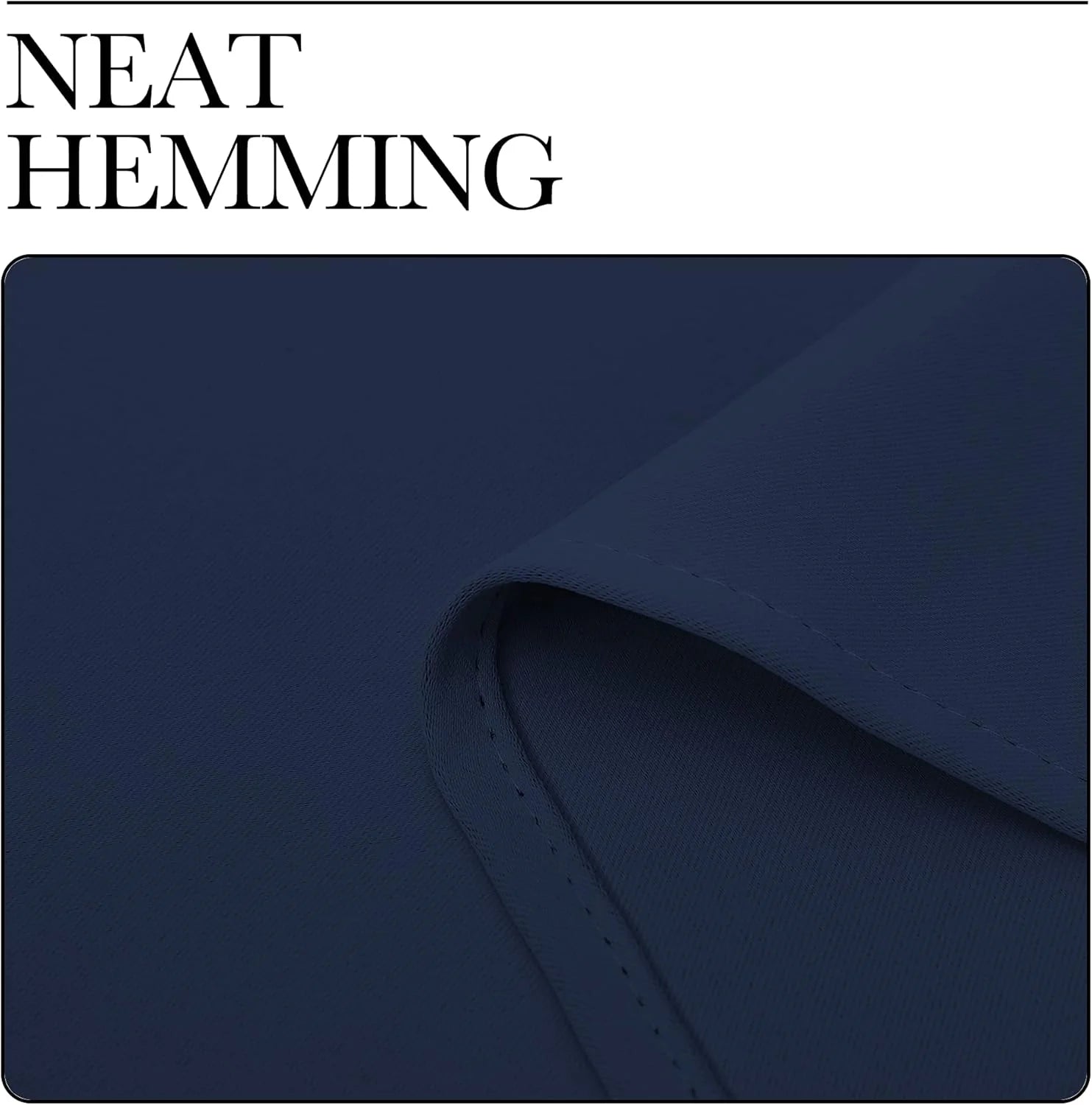 Close-up of navy curtain fabric showing neat hemming and stitched edge detail