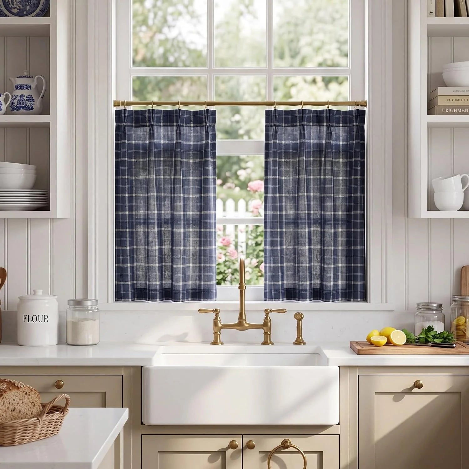 Navy plaid cafe curtains on a brass rod above a farmhouse kitchen sink