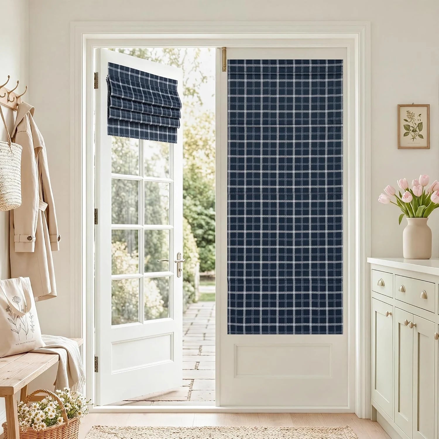 Navy plaid fabric Roman shades on a white glass patio door in a bright entryway