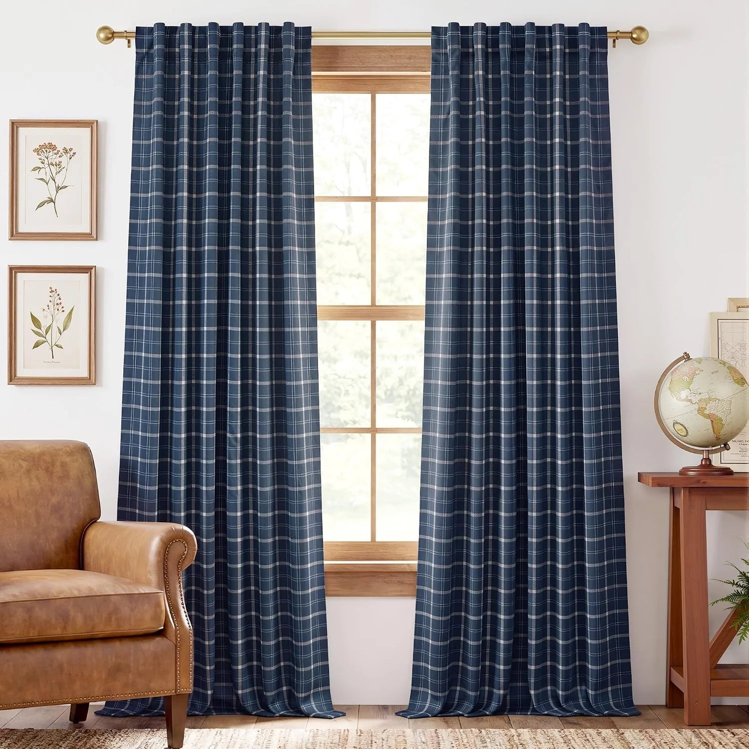 Navy blue plaid curtain panels on a brass rod in a bright farmhouse living room