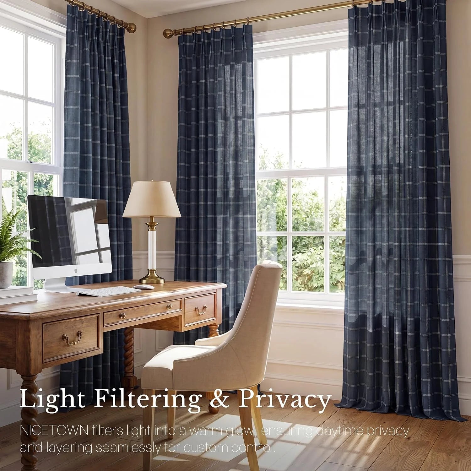 Navy plaid light-filtering curtains hanging in a bright home office with wood desk