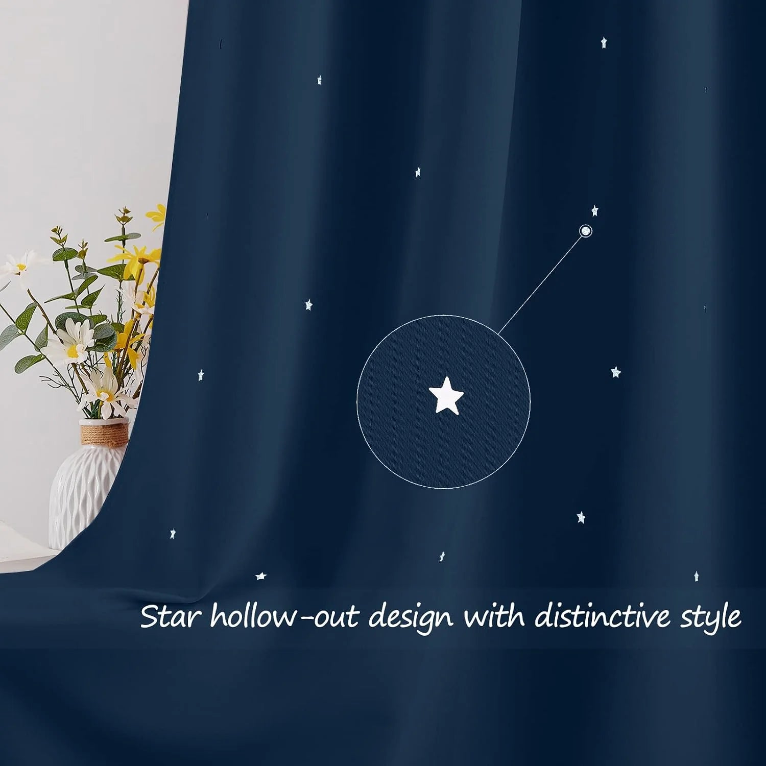 Navy curtain panel with small white star cutout pattern in a soft indoor setting