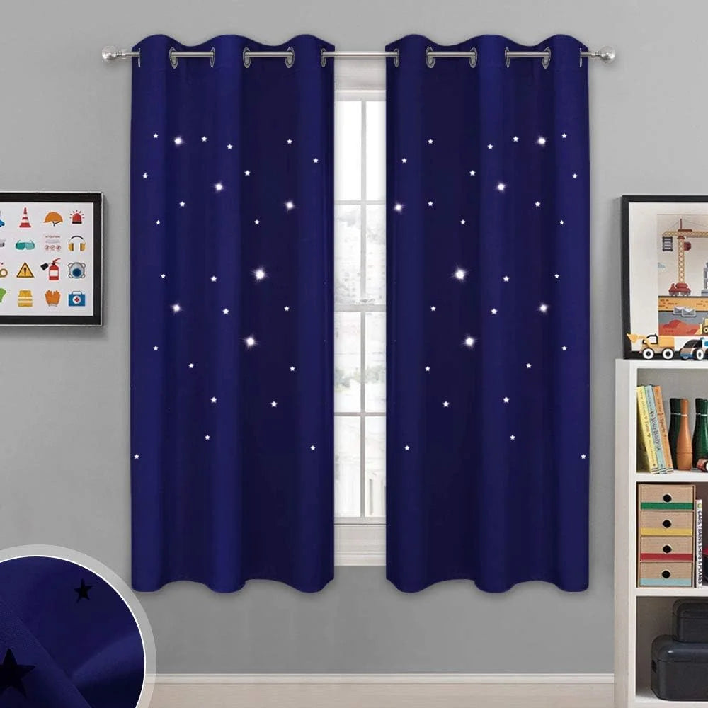 Navy blue star-pattern grommet curtains hanging in a modern kids room window