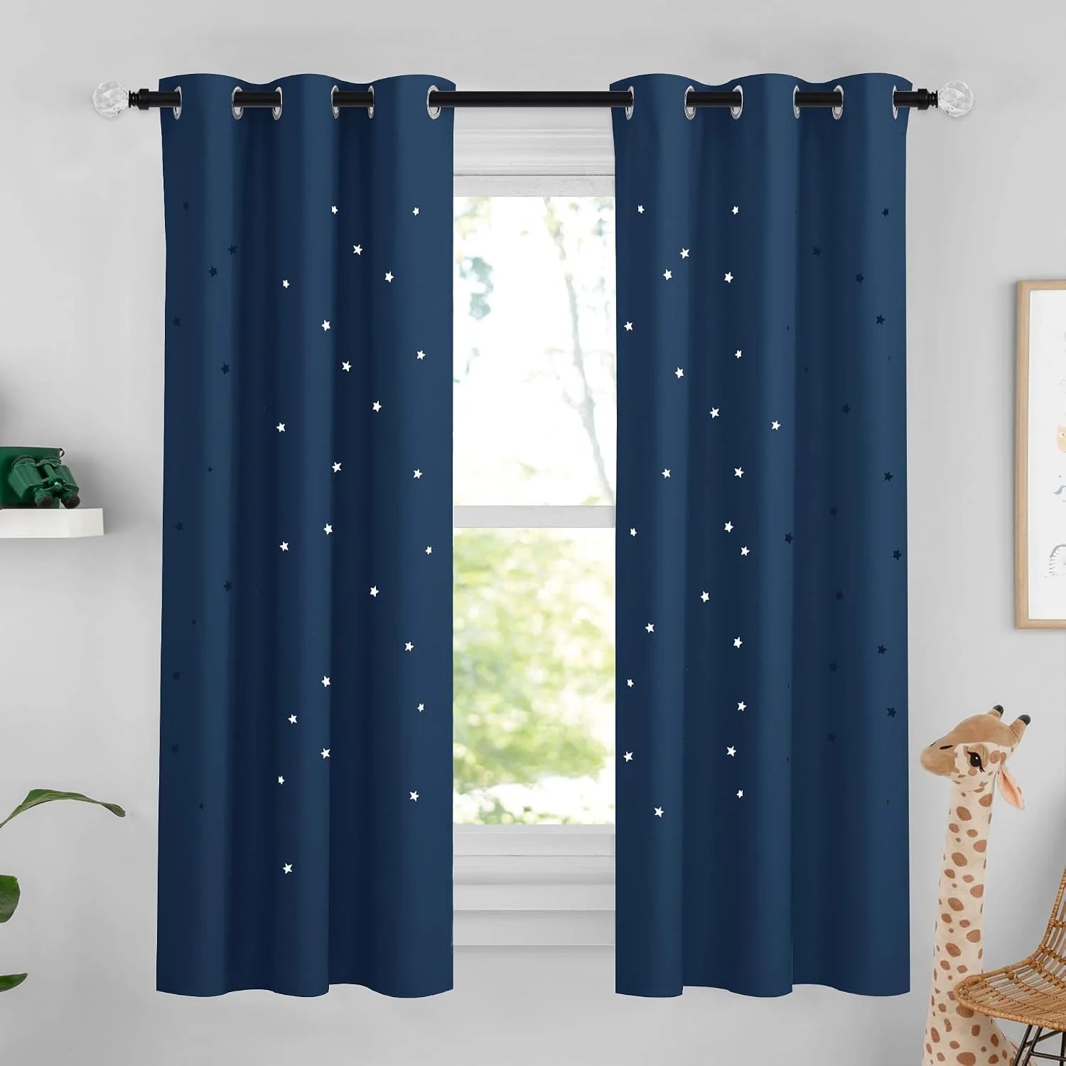 Navy blue kids curtains with star cutout pattern and silver grommet top