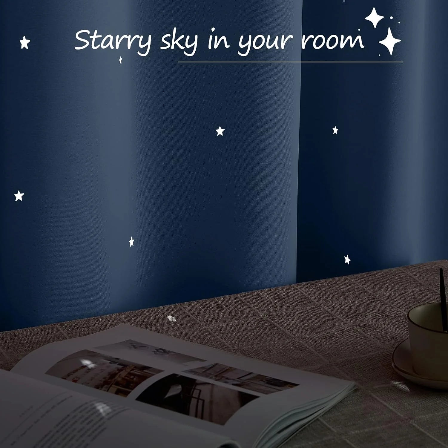 Navy blackout curtain with white star print creating a starry bedroom mood