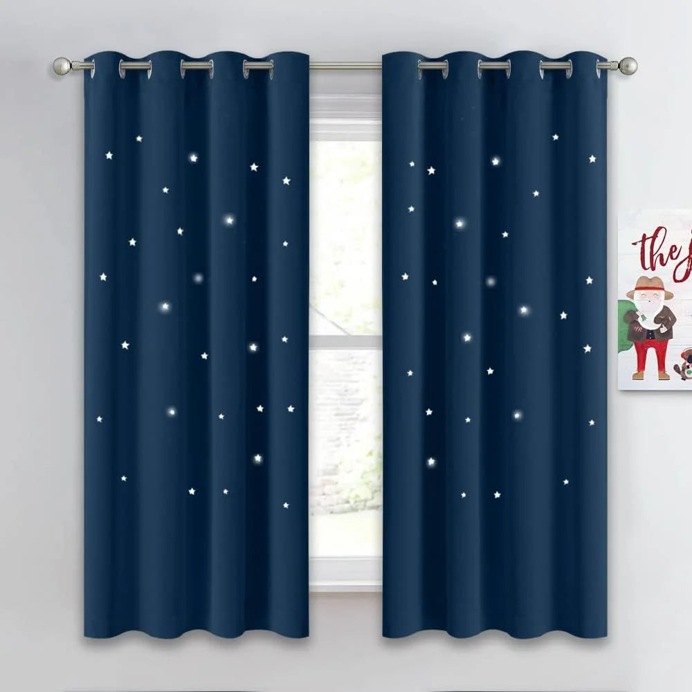 Navy blue curtains with white star print and silver grommets on a window