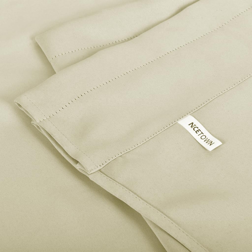 Folded NCETOWN light khaki curtain panel with visible stitching details and smooth fabric texture.