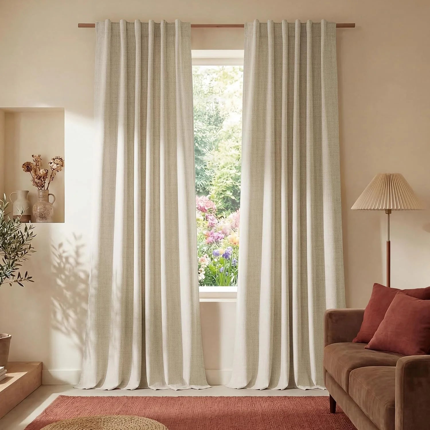 Light beige textured curtains on a wooden rod in a warm, natural living room