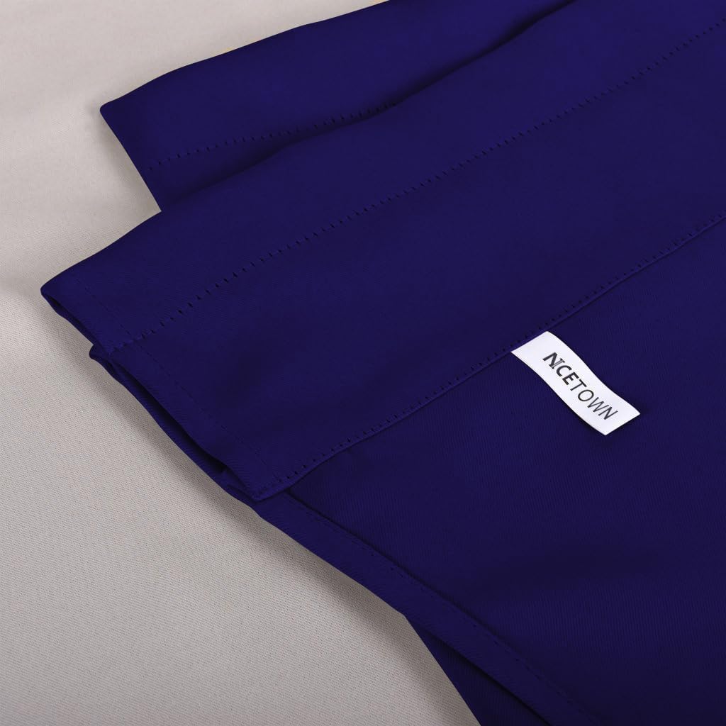 Close-up of a deep purple NICETOWN blackout curtain panel with smooth fabric and visible top stitching.