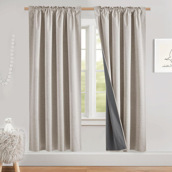 Oatmeal textured rod pocket curtains with dark gray blackout lining. One panel shows the lining.