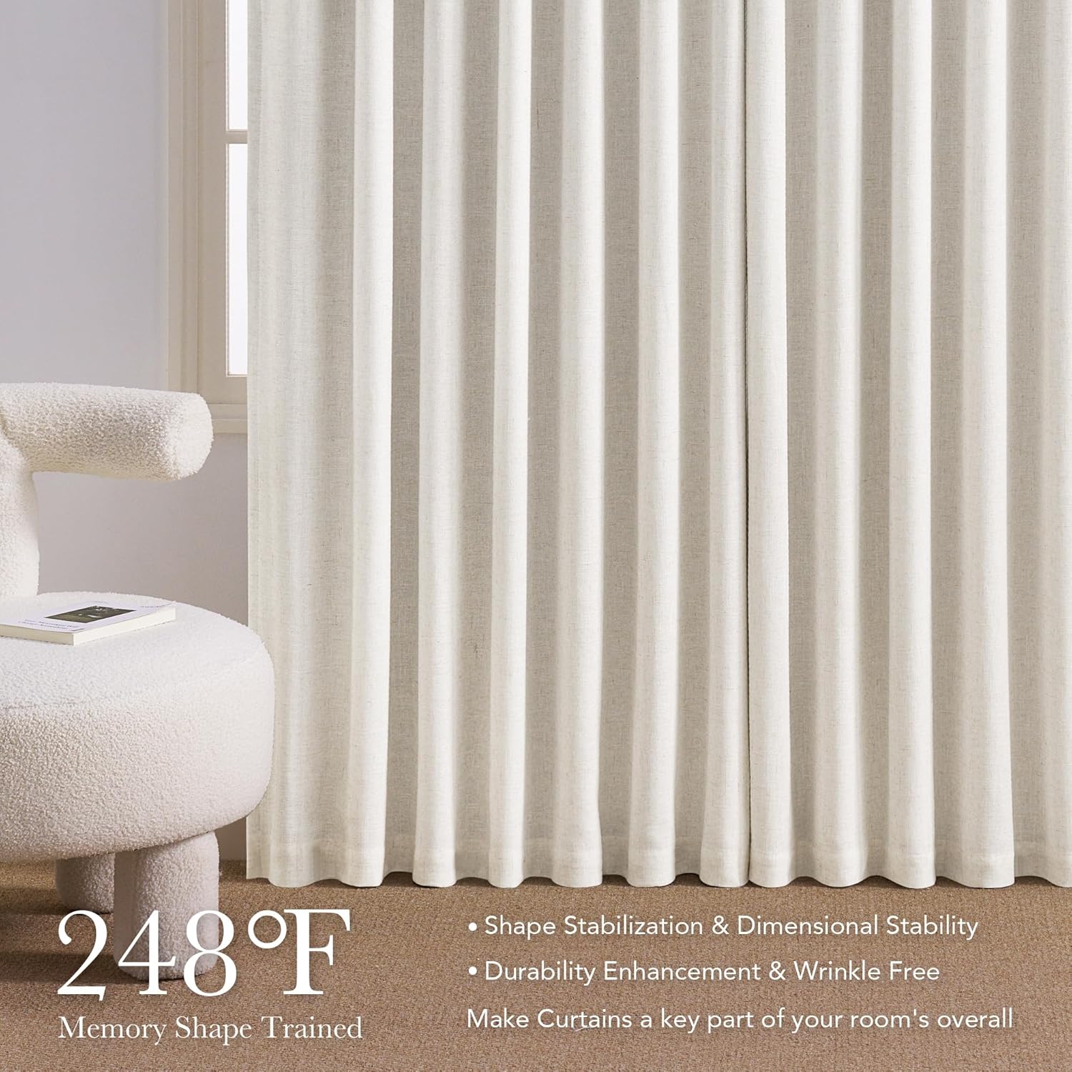 Textured off-white linen blend curtains with crisp memory pleats hanging by a window.