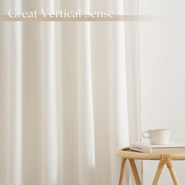 Off-white textured curtain, exhibiting strong vertical folds and an elegant, minimalist drape.