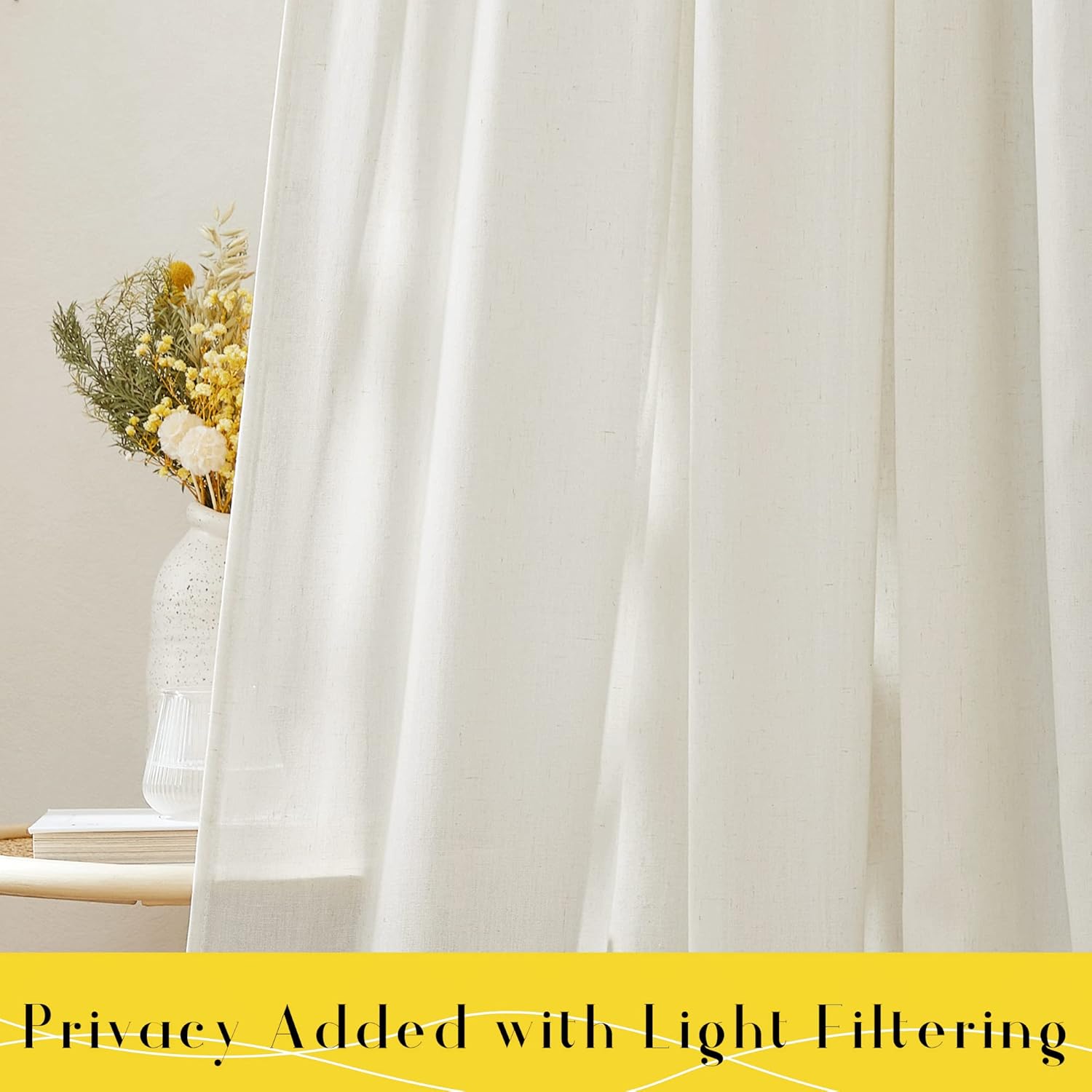 Off-white textured light filtering curtain panel, softly draped to provide privacy and diffuse sunlight.