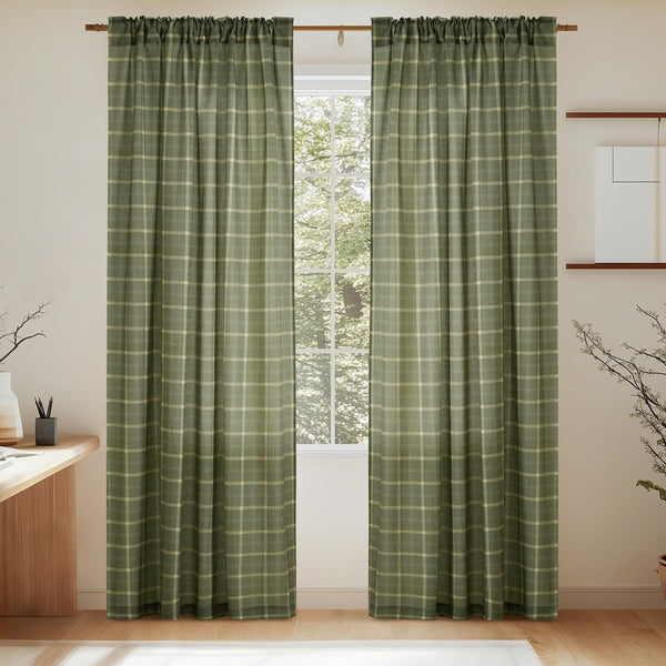 Olive green plaid curtains with woven texture and gathered rod pocket top, hanging over a window.