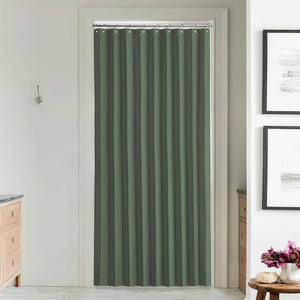 Olive green pleated fabric curtain covers a doorway, hung on a silver rod, offering privacy.