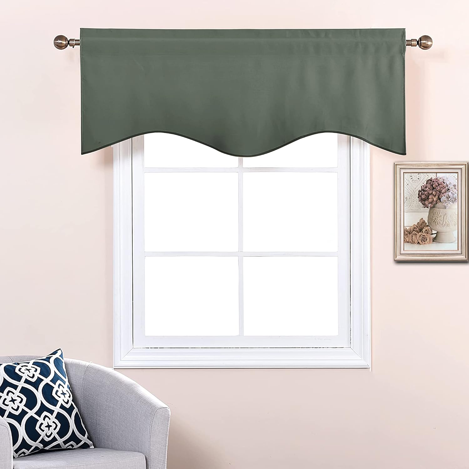 Dark olive green rod pocket valance with a scalloped bottom edge, hanging above a white window.