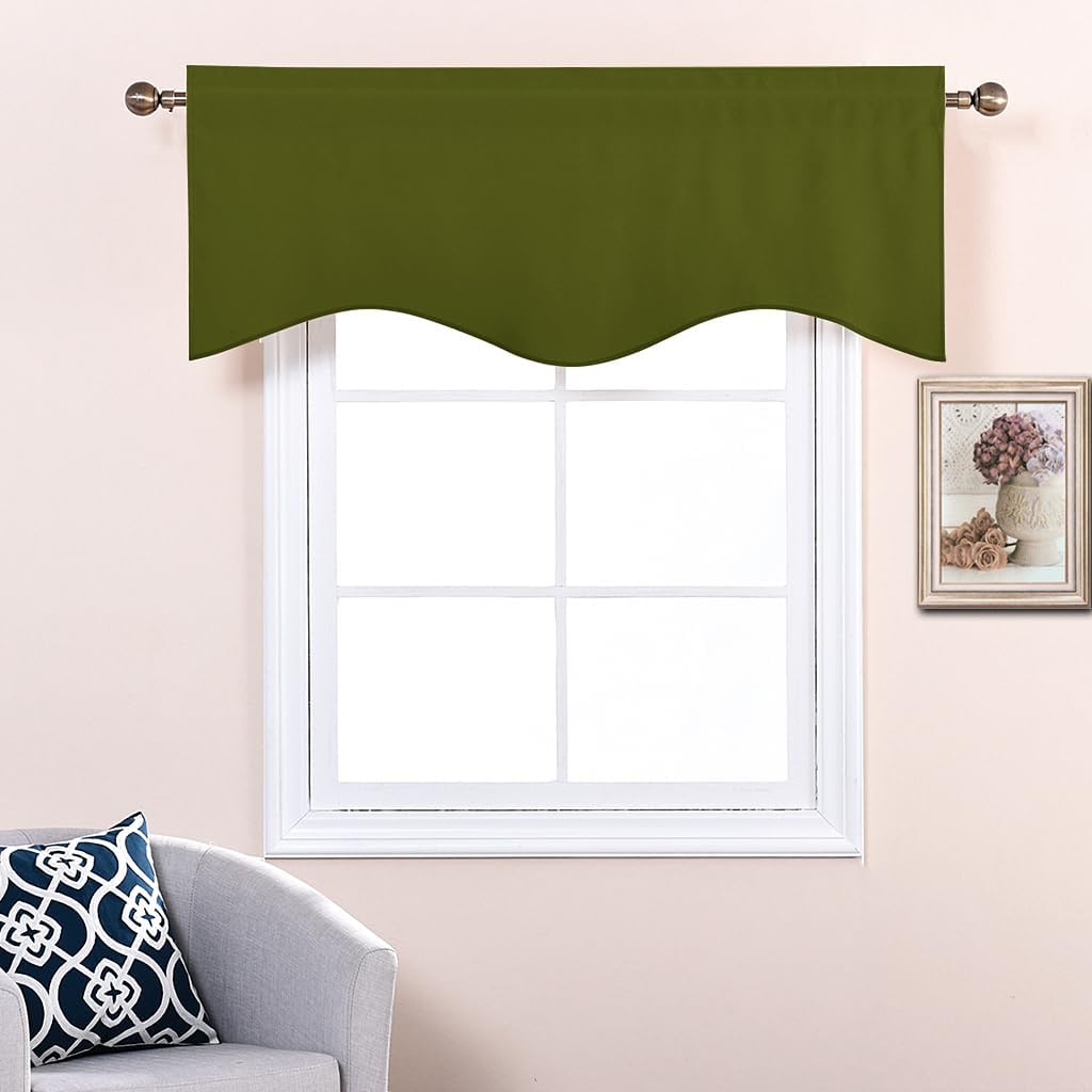 Solid olive green window valance with scalloped bottom edge hanging on a metal curtain rod.