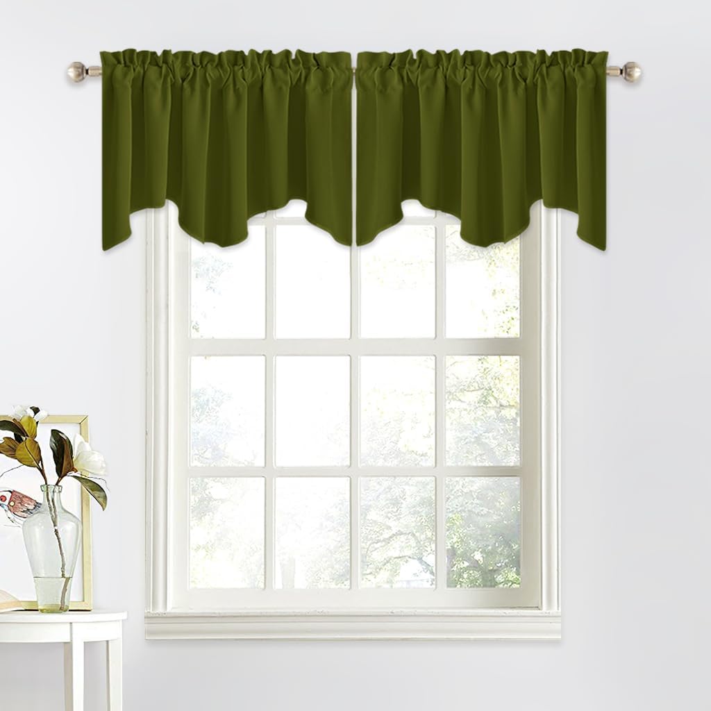 Olive green scalloped window valance with rod pocket top hanging on a metal rod.