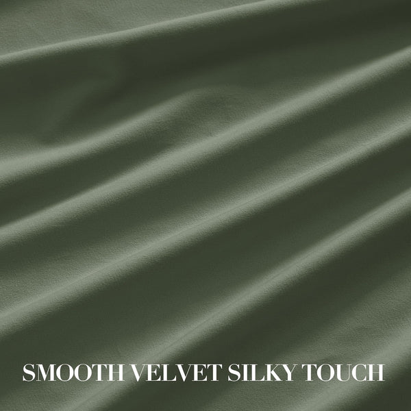 Close-up of a draped olive green velvet fabric, showcasing its smooth, silky texture and soft sheen.