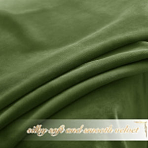 Deep olive green velvet fabric with soft, smooth texture and elegant drapes.