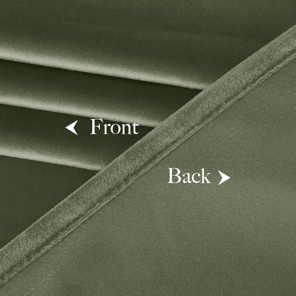 Close-up of olive green blackout curtain fabric, showing plush velvet front and tightly woven back.