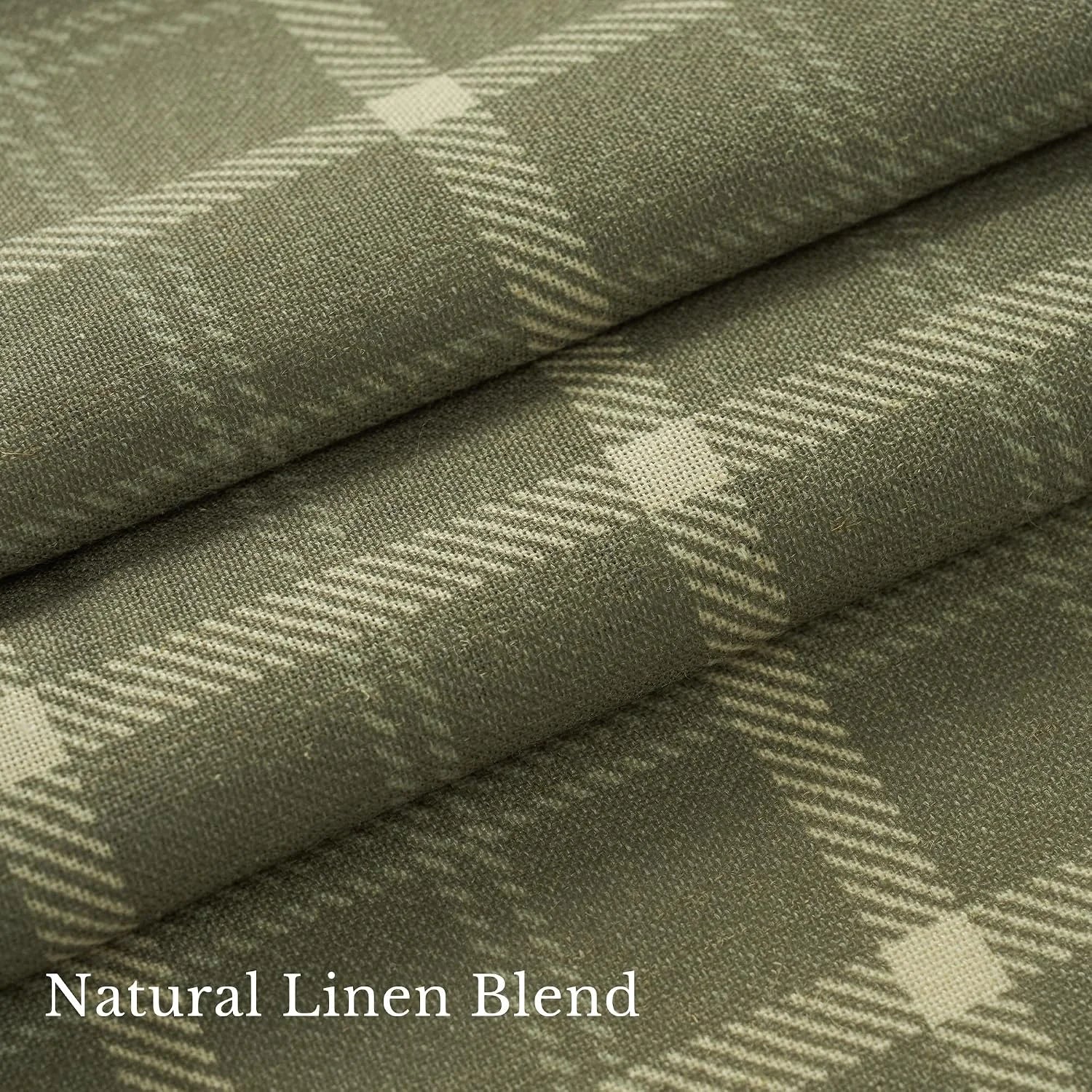 Close-up of olive green linen blend fabric with a soft cream plaid pattern