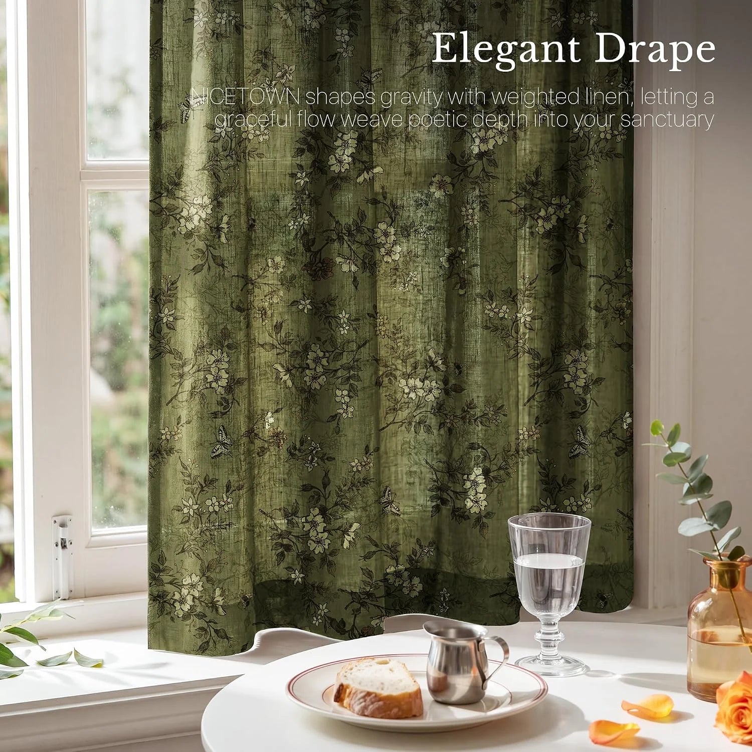 Olive green floral linen drape hanging by a bright window above a cozy breakfast table