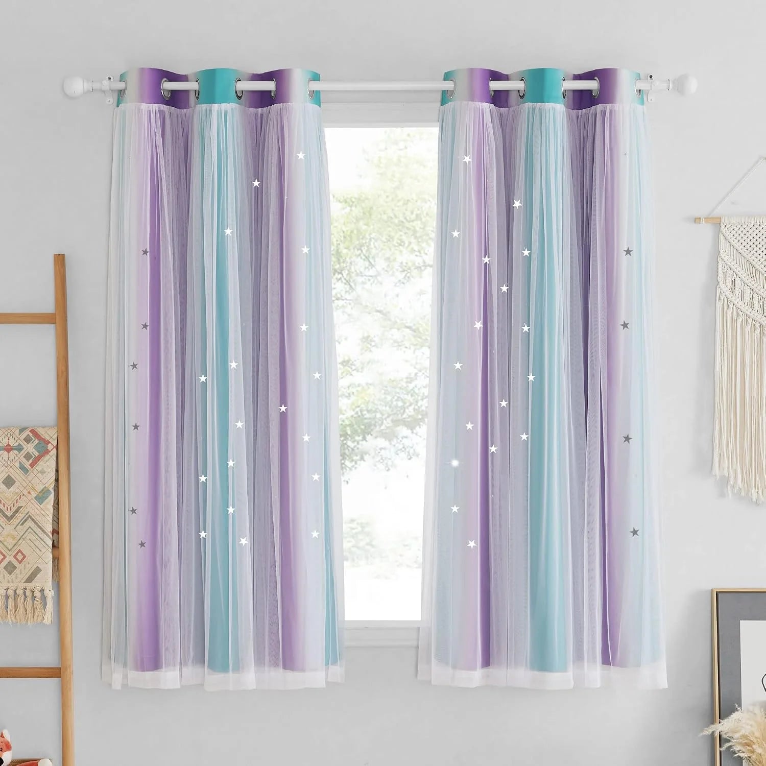 Pastel ombre sheer curtains with silver stars and grommet top on a bedroom window