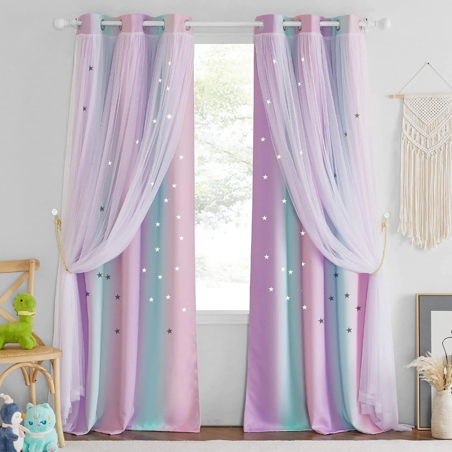 Pastel rainbow star curtains with sheer overlay in a whimsical kids bedroom
