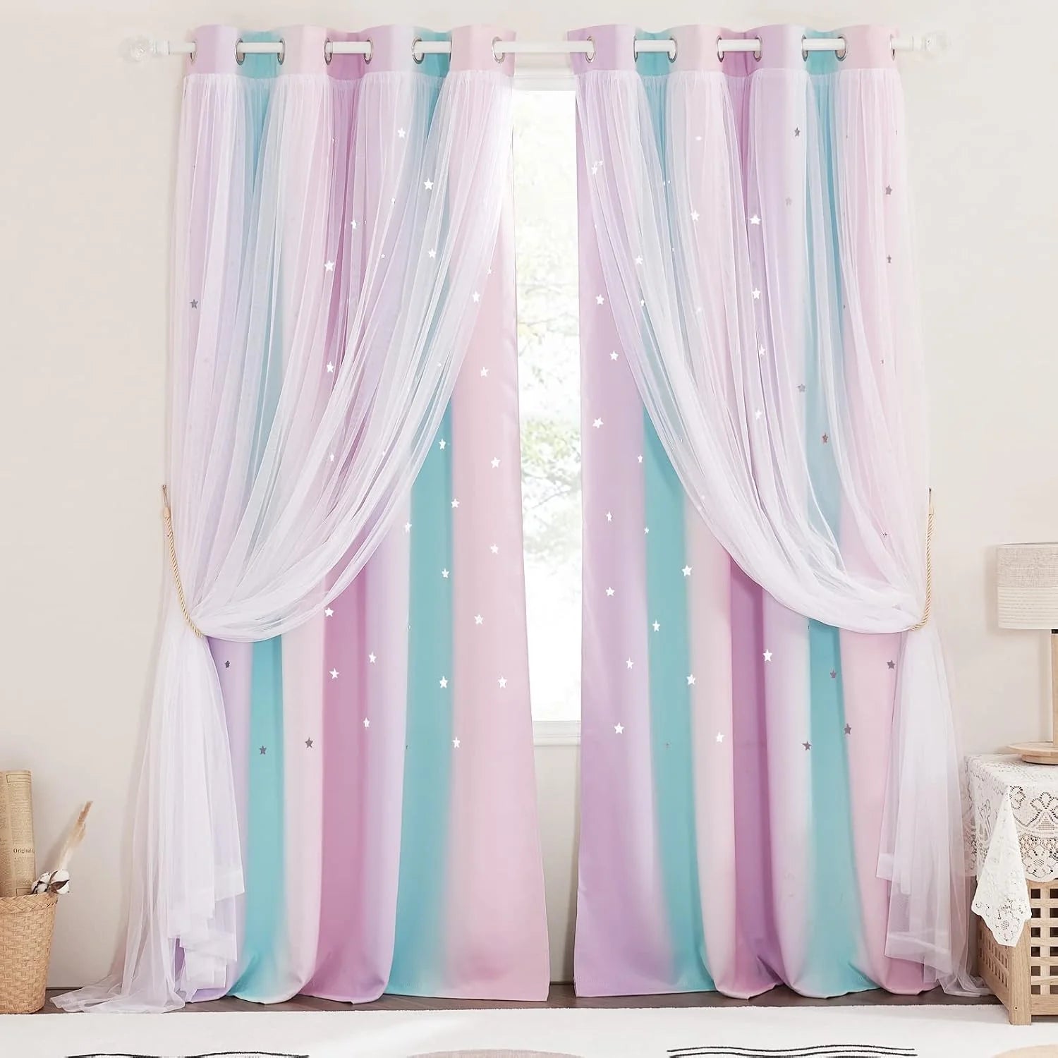 Pastel rainbow curtains with white sheer overlay and star details on a bedroom window