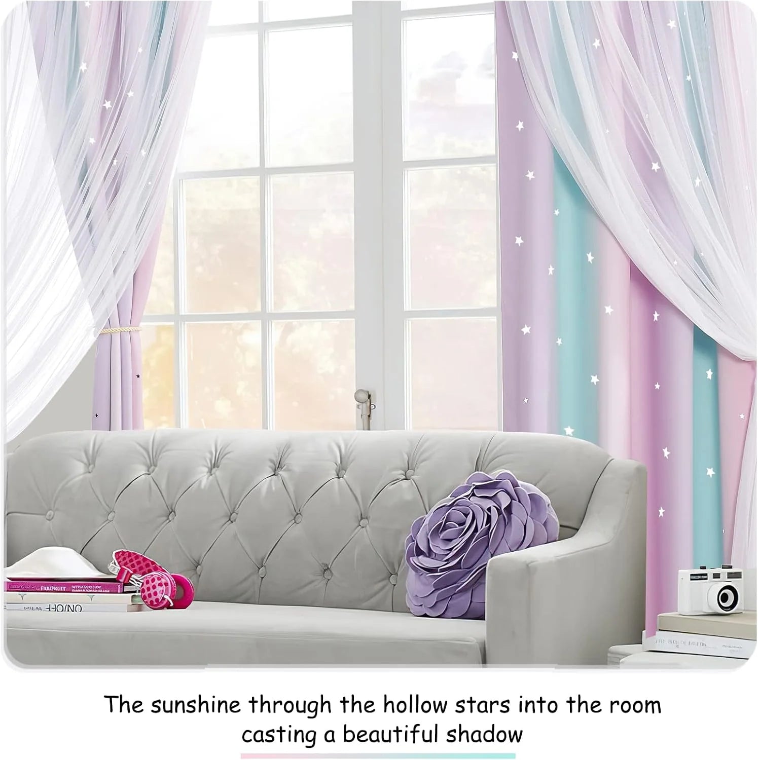 Pastel pink and blue star curtains with white sheer drapes in a whimsical kids room