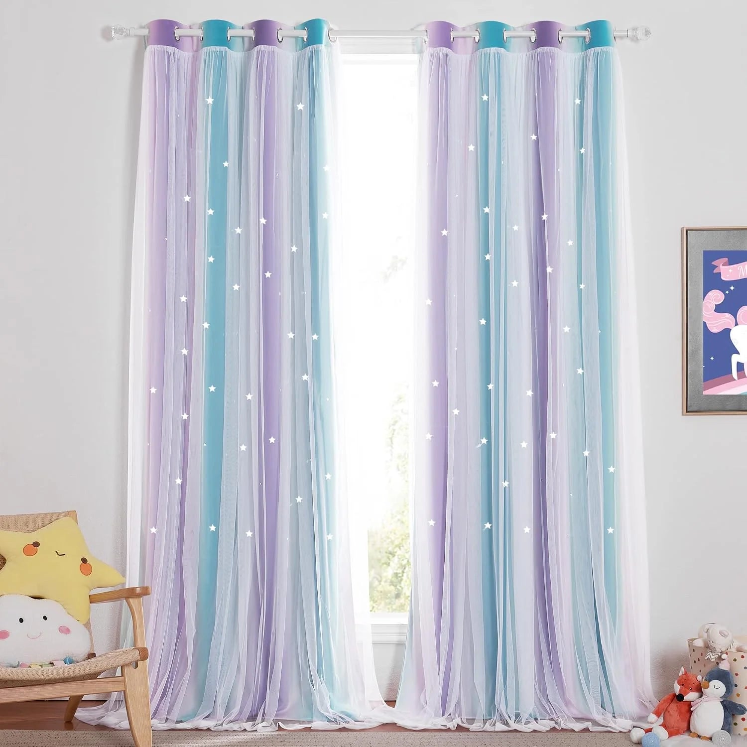 Pastel blue and lavender sheer star curtains hanging in a whimsical kids bedroom