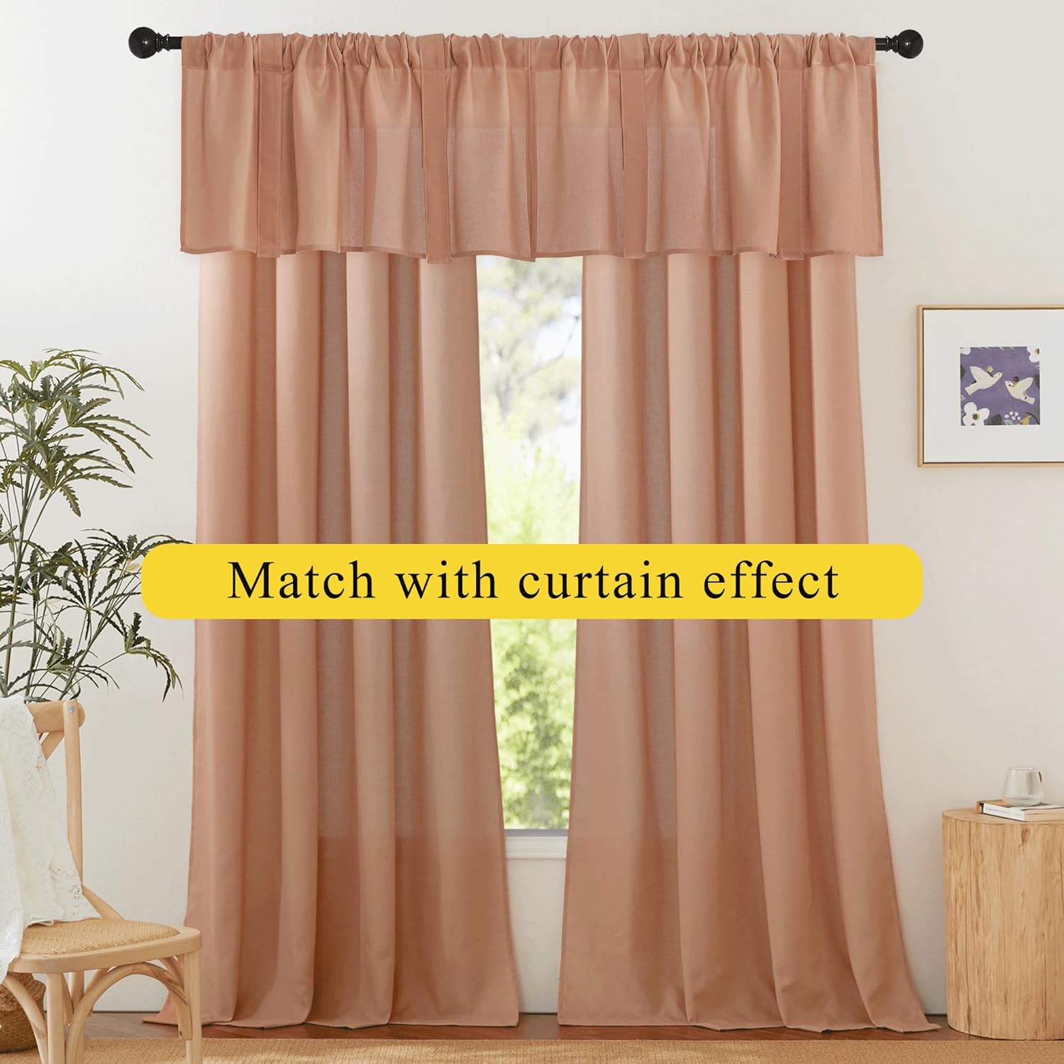 Peach rod pocket valance layered over matching full-length curtains on black rod. Casual window treatment.