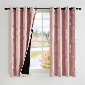Modern pink curtains with silver wave design and grommet top, showing blackout lining.